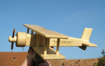 Planes  - toys from wood with burned name on body as gift
