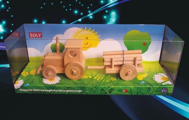 Tractor wooden toy with trailer of timber