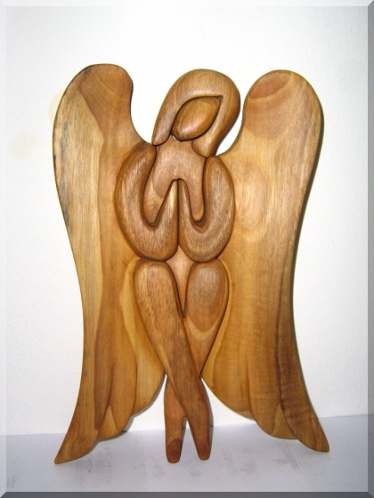 Angel sitting, wood sculpture carving