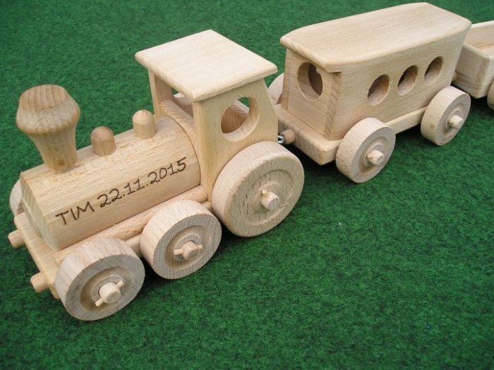 Children train wooden toys
