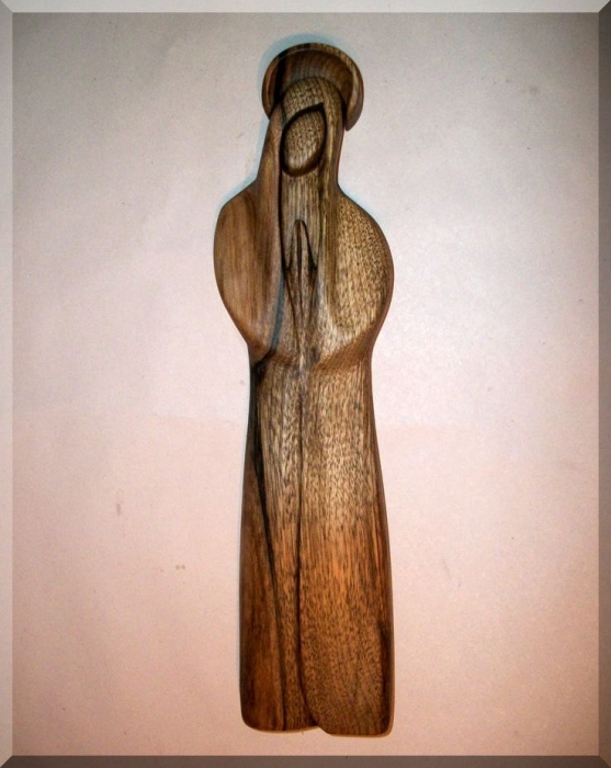 The Holy Virgin Mary with a halo, wooden sculpture 